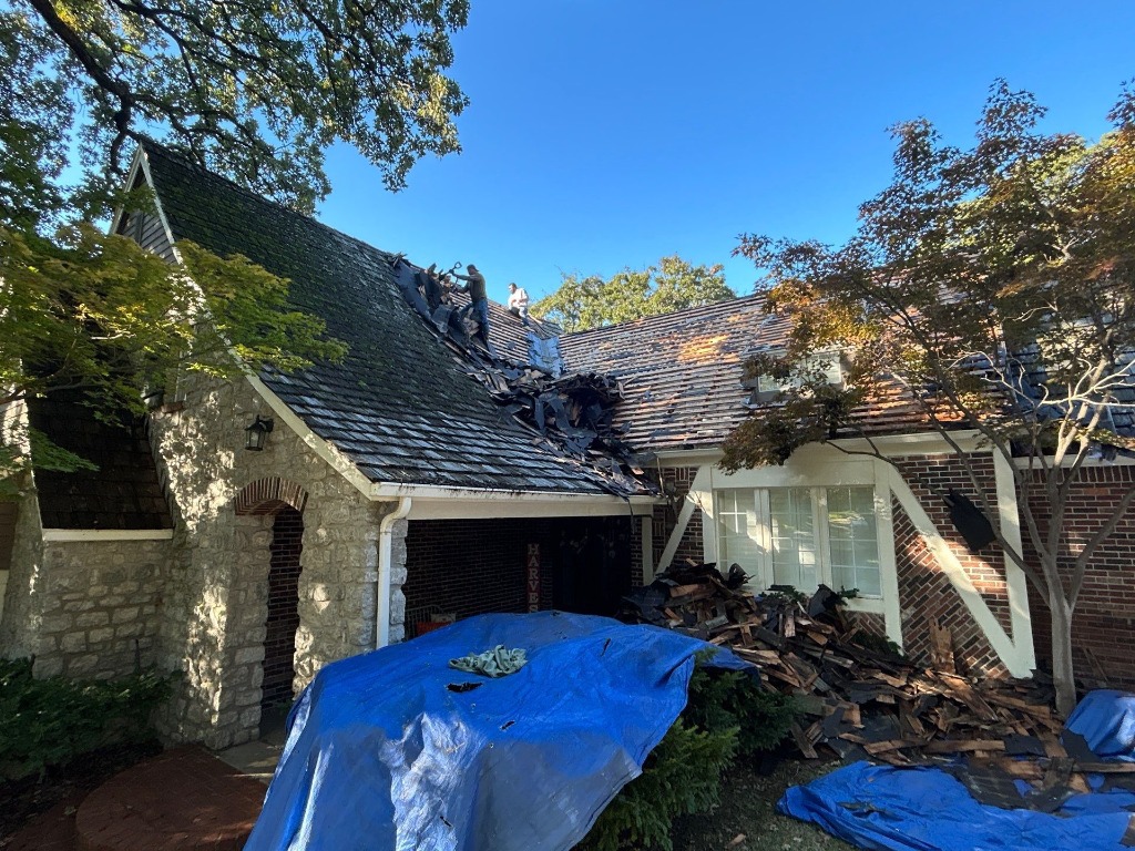 Tear off on a steep pitched roof